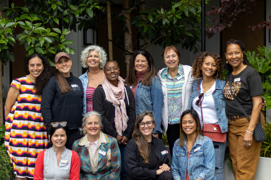 A group of educators pose together at a CRLP event.